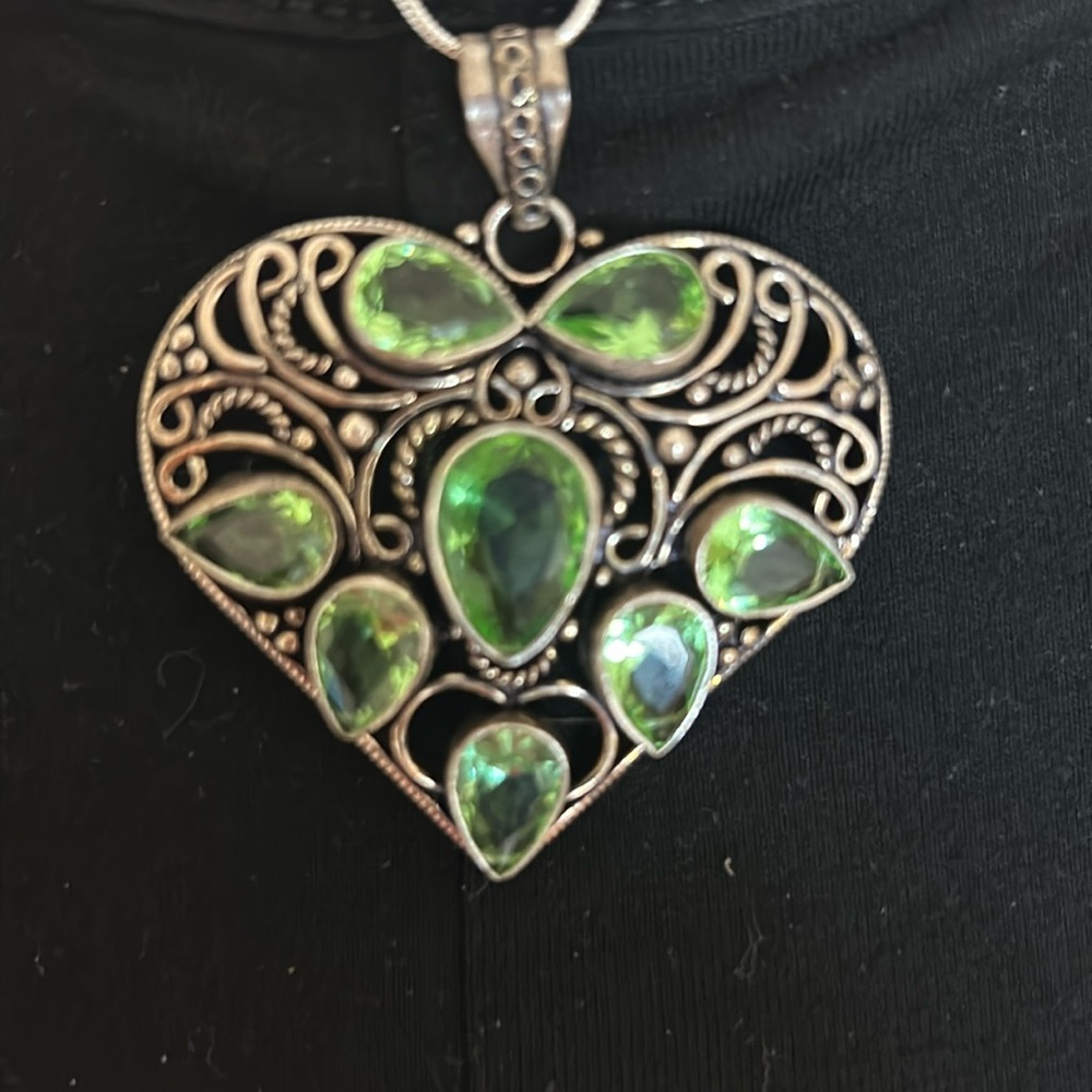 Silver heart necklace with green stones